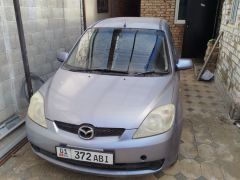 Фото авто Mazda Demio