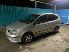 Photo of the vehicle Nissan Almera Tino