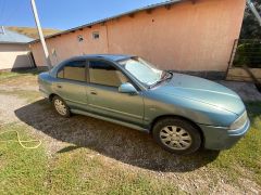 Сүрөт унаа Mitsubishi Carisma