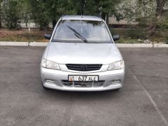 Сүрөт унаа Mazda Demio