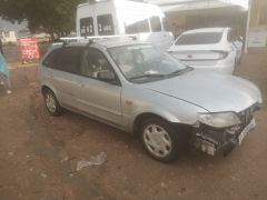 Сүрөт унаа Mazda 323