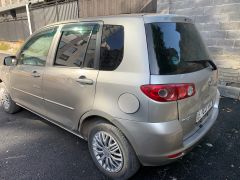 Сүрөт унаа Mazda Demio