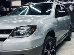 Сүрөт унаа Mitsubishi Outlander