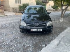 Фото авто Nissan Almera Tino