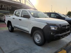 Фото авто Mitsubishi L200