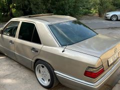 Сүрөт унаа Mercedes-Benz W124