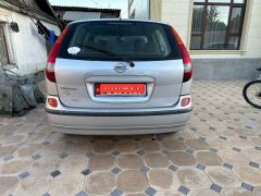 Фото авто Nissan Almera Tino