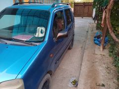 Photo of the vehicle Suzuki Wagon R+