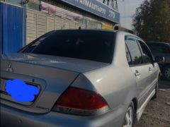 Фото авто Mitsubishi Lancer