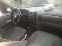 Фото авто Mazda 323