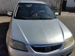 Фото авто Mazda 323