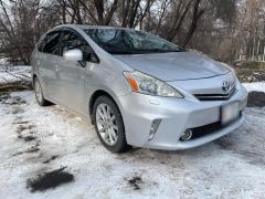 Фото авто Toyota Prius v (+)