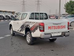 Фото авто Mitsubishi L200