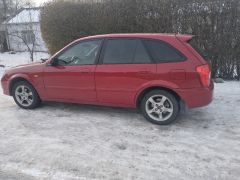 Photo of the vehicle Mazda 323