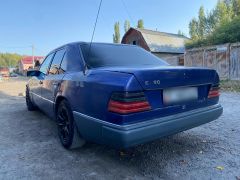 Сүрөт унаа Mercedes-Benz W124