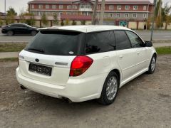 Photo of the vehicle Subaru Legacy