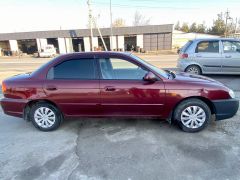 Сүрөт унаа Kia Spectra