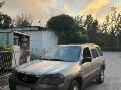 Photo of the vehicle Mazda Tribute