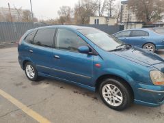 Фото авто Nissan Almera Tino