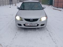 Фото авто Mazda 323