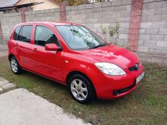 Photo of the vehicle Mazda Demio