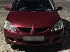 Сүрөт унаа Mitsubishi Lancer