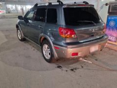 Фото авто Mitsubishi Outlander