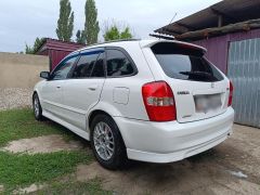 Фото авто Mazda Familia