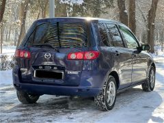 Фото авто Mazda Demio