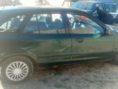 Сүрөт унаа Mazda 323