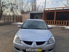 Фото авто Mitsubishi Lancer