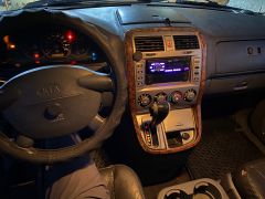 Сүрөт унаа Kia Carnival