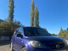 Сүрөт унаа Mazda Demio