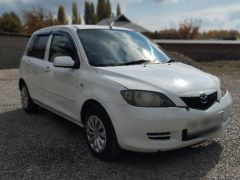 Фото авто Mazda Demio