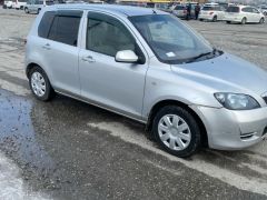 Фото авто Mazda Demio