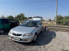 Photo of the vehicle Mazda 323