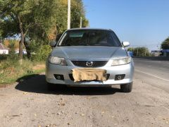 Сүрөт унаа Mazda 323