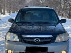 Photo of the vehicle Mazda Tribute