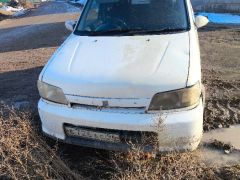 Фото авто Nissan Cube