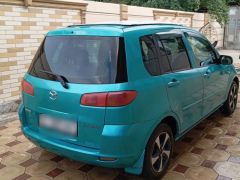 Photo of the vehicle Mazda Demio