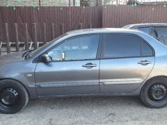 Photo of the vehicle Mitsubishi Lancer