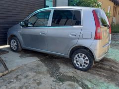 Сүрөт унаа Daihatsu Cuore