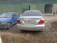 Фото авто Mitsubishi Lancer