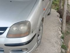 Сүрөт унаа Nissan Almera Tino