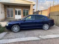 Сүрөт унаа Mitsubishi Carisma