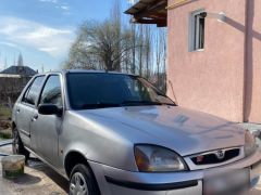 Сүрөт унаа Mazda 121