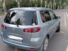 Photo of the vehicle Mazda Demio