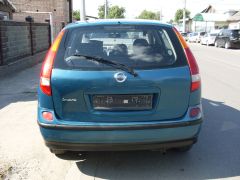 Фото авто Nissan Almera Tino