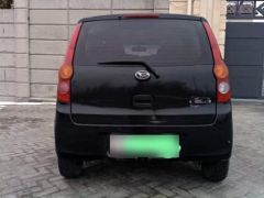 Photo of the vehicle Daihatsu Cuore