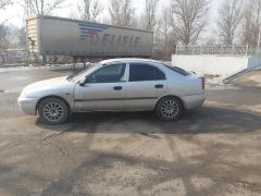 Сүрөт унаа Mitsubishi Carisma